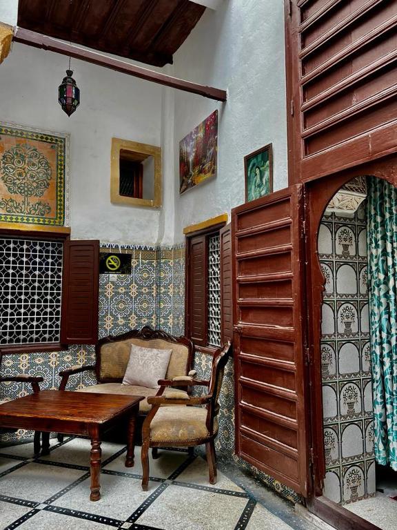 Posezení v ubytování Riad Le Palais