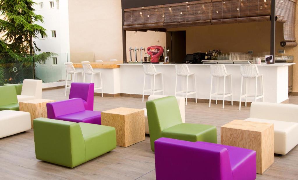 A seating area at ALEGRIA Maripins