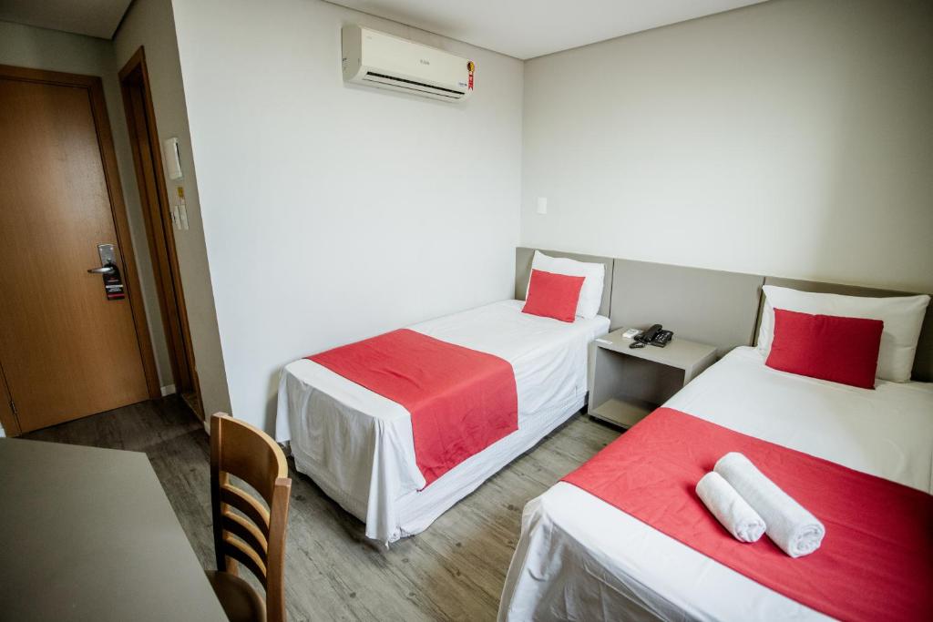 Katil atau katil-katil dalam bilik di Lagoa Flat Hotel