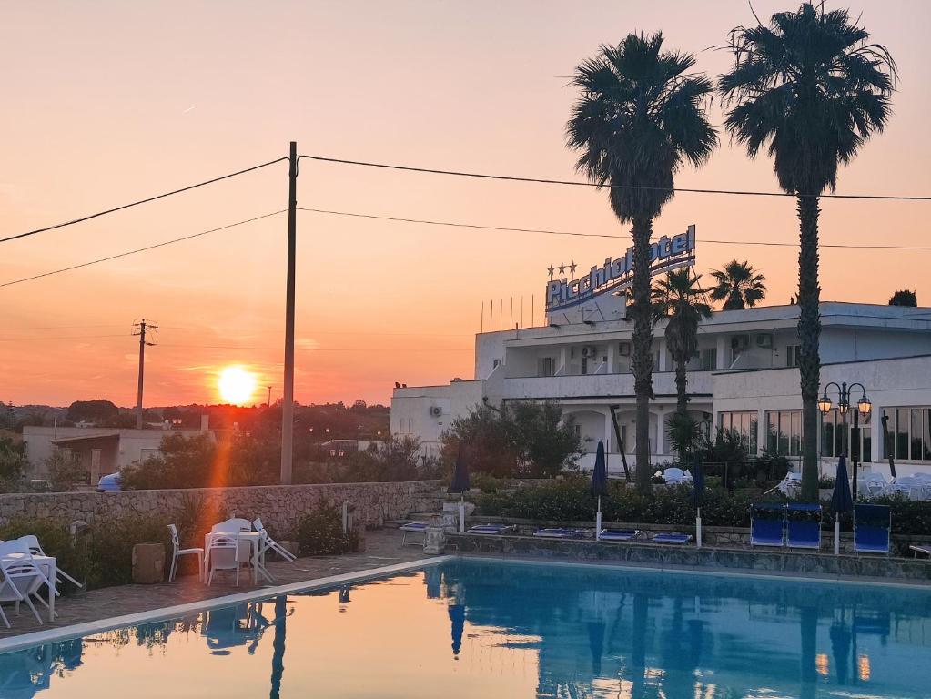 Bazén v ubytování Picchio Hotel Pescoluse nebo v jeho okolí