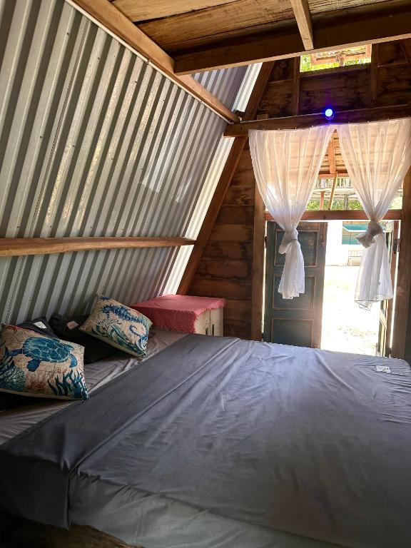 Postel nebo postele na pokoji v ubytování Homie Hava Homestay