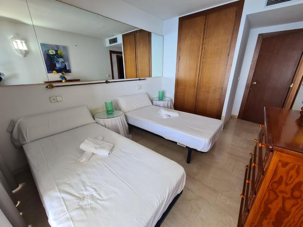 Postel nebo postele na pokoji v ubytování Apartamento Santa Margarita IF Benidorm
