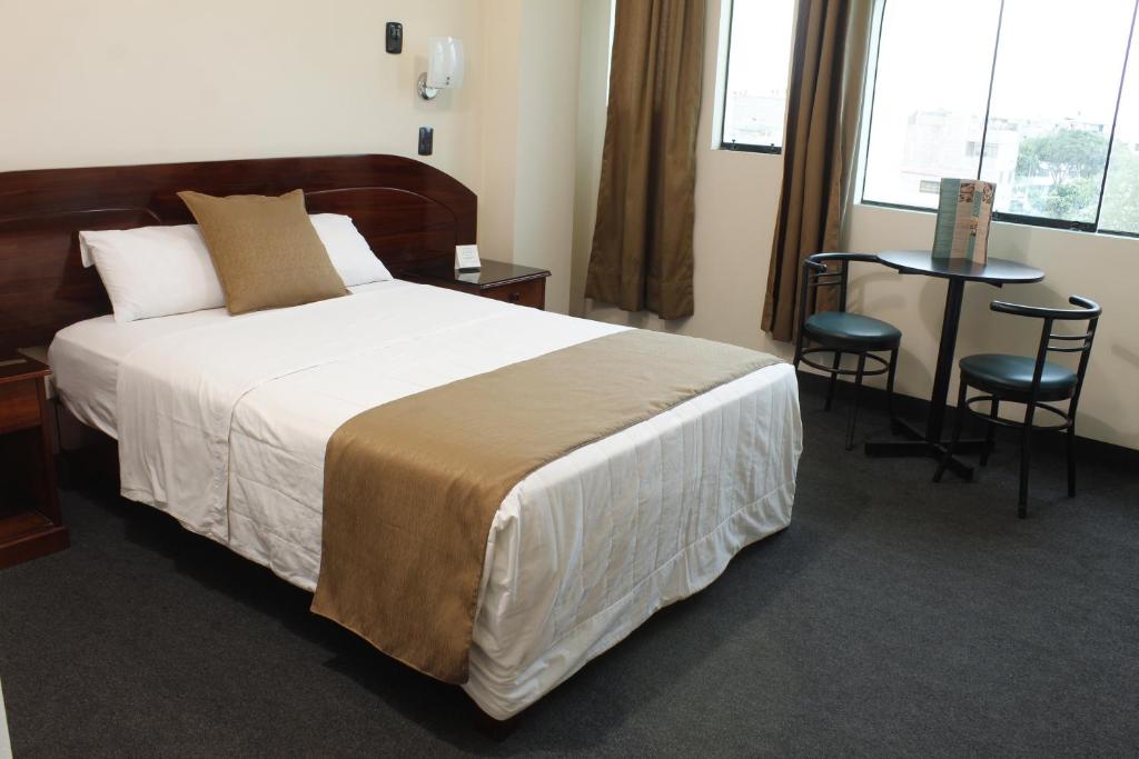 Letto o letti in una camera di Amara Hotel