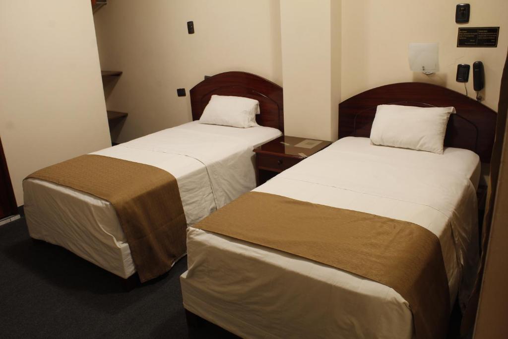 Letto o letti in una camera di Amara Hotel