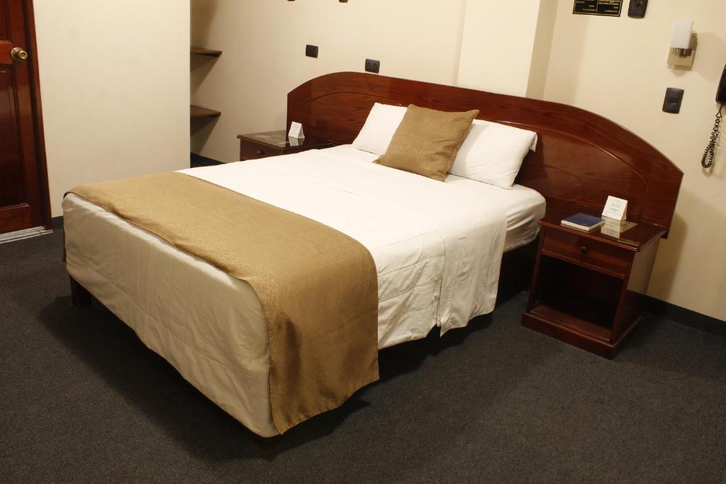 Letto o letti in una camera di Amara Hotel