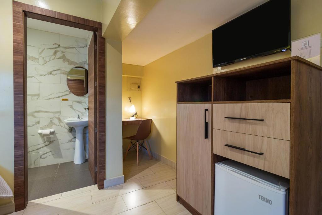 Kuchyň nebo kuchyňský kout v ubytování Hotel Sada