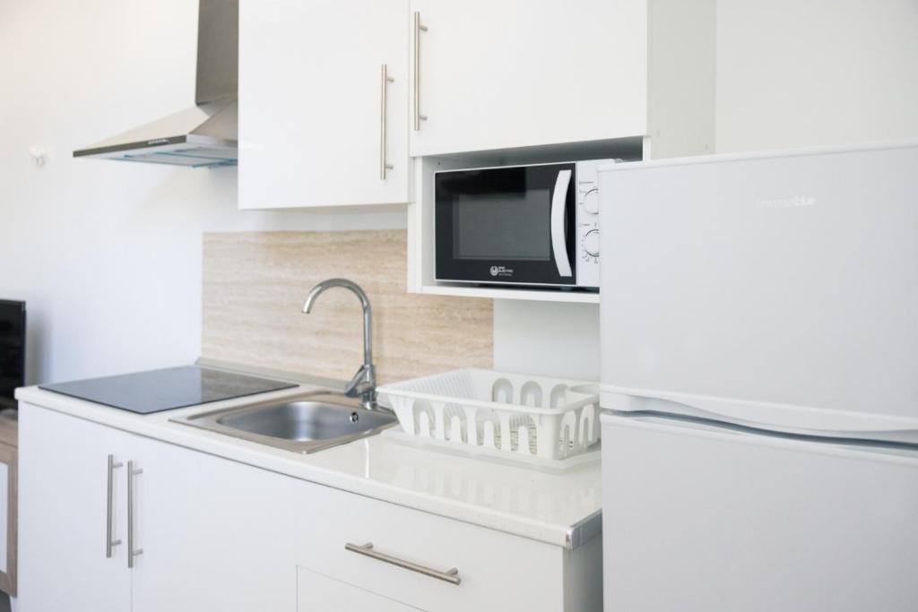 Kuchnia lub aneks kuchenny w obiekcie Apartamento VELARDE CENTER one