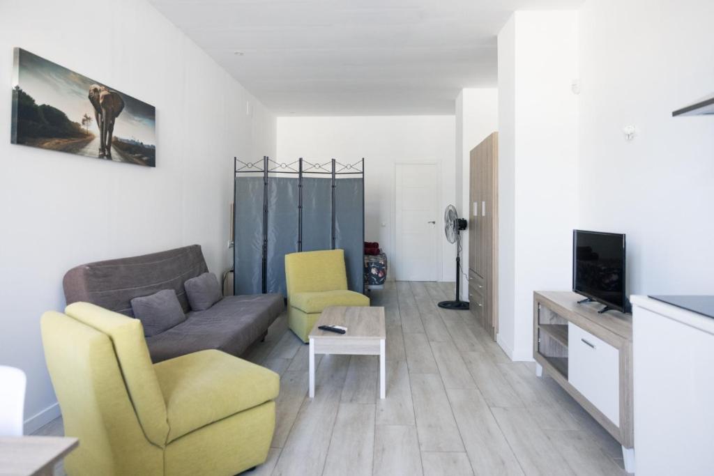 Telewizja i/lub zestaw kina domowego w obiekcie Apartamento VELARDE CENTER one