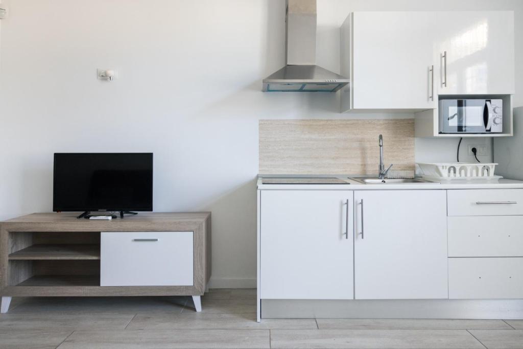 Kuchnia lub aneks kuchenny w obiekcie Apartamento VELARDE CENTER one