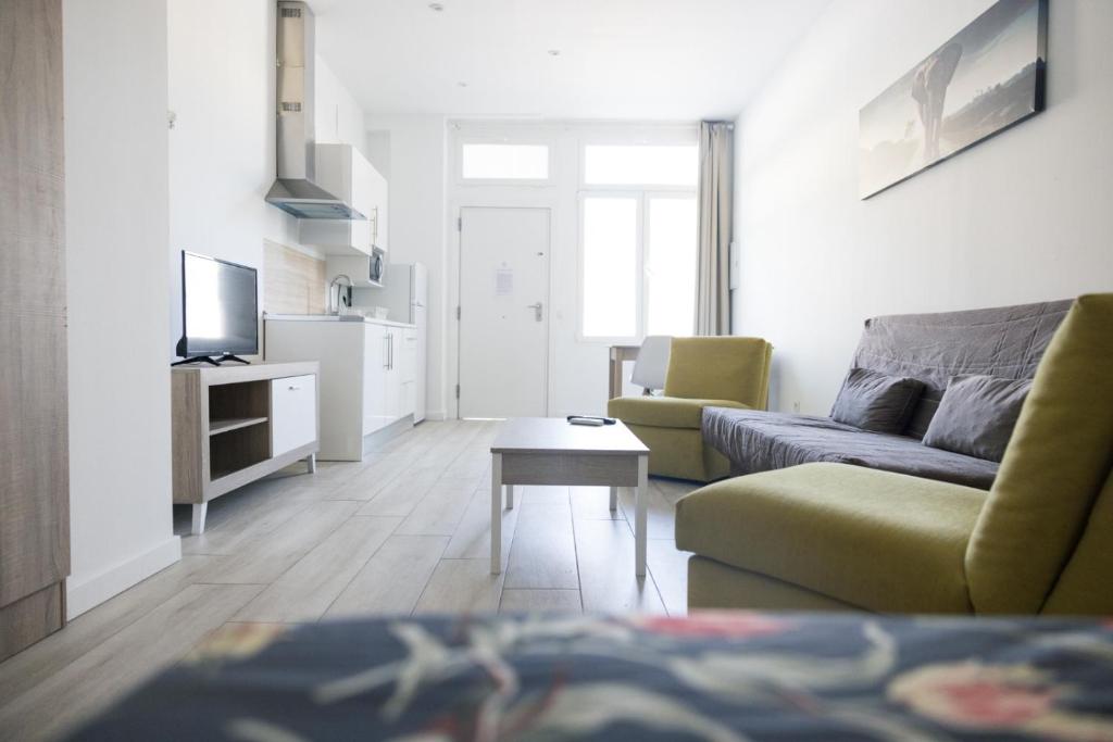 Telewizja i/lub zestaw kina domowego w obiekcie Apartamento VELARDE CENTER one