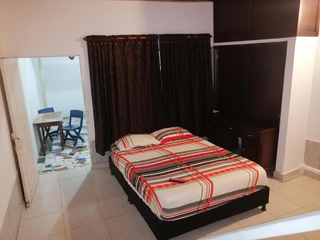 Postel nebo postele na pokoji v ubytování casa de relajación lowcost