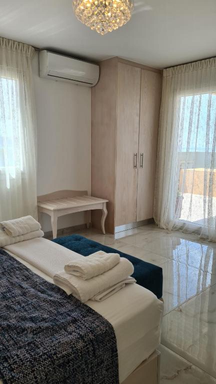 Postel nebo postele na pokoji v ubytování Elite Residence