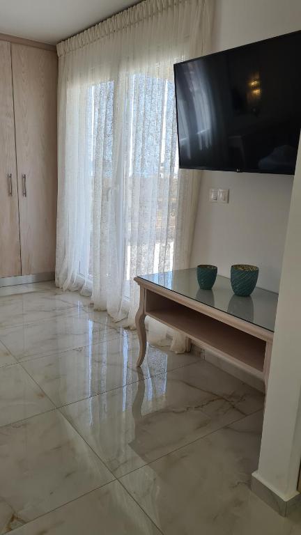 TV a/nebo společenská místnost v ubytování Elite Residence
