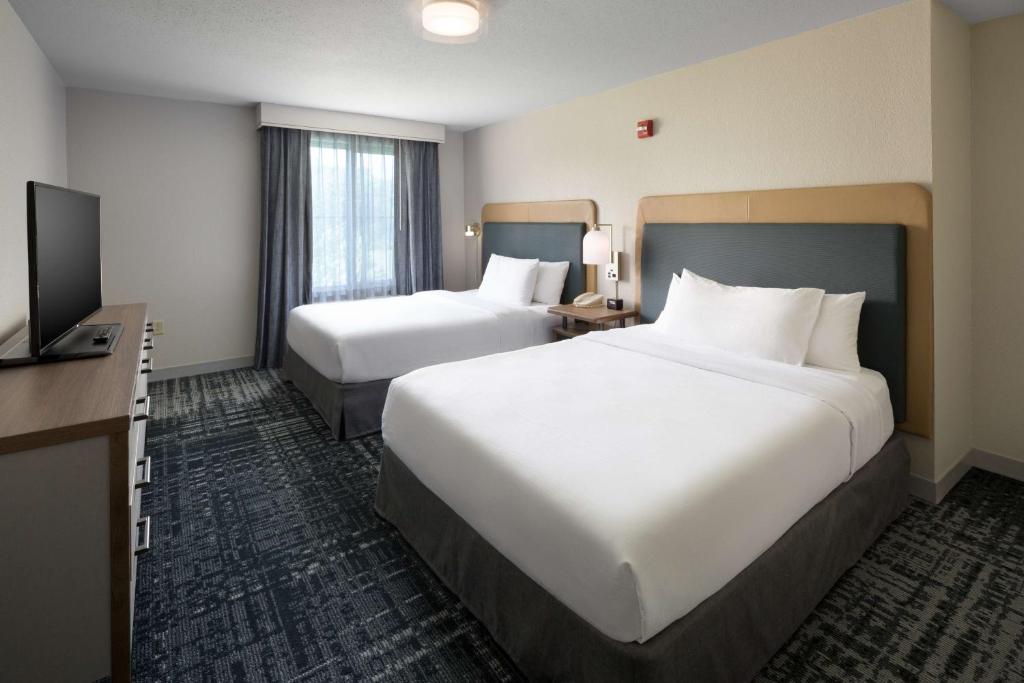 Postel nebo postele na pokoji v ubytování Homewood Suites by Hilton Newburgh-Stewart Airport