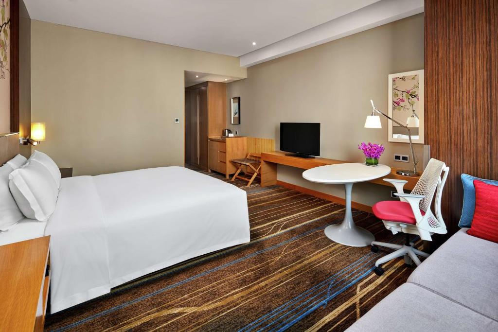 TV a/nebo společenská místnost v ubytování Hilton Garden Inn Shenzhen Bao'an