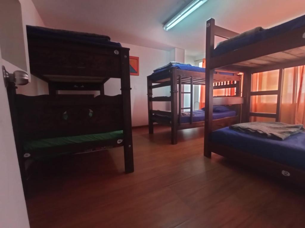 Postel nebo postele na pokoji v ubytování North House Hostel