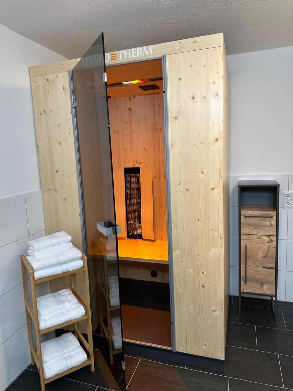 a locker room with a desk in a room at Apart Finazzer in Wenns