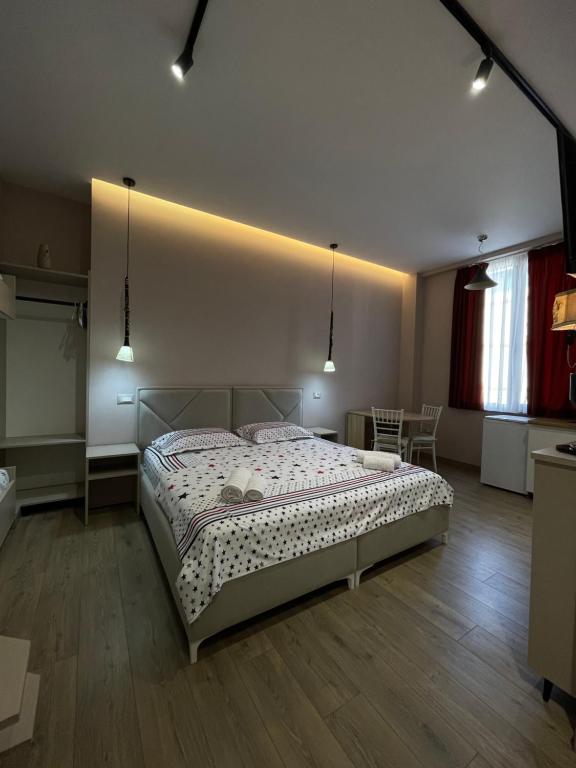 Postel nebo postele na pokoji v ubytování apartamente Melodi