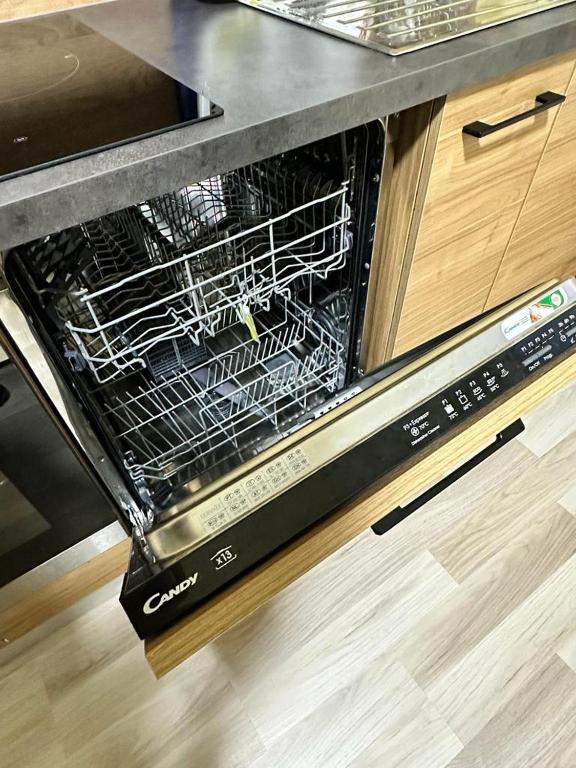 Kuchyň nebo kuchyňský kout v ubytování CAN appart spacieux avec grand jardin et terrasse 1 à 8 pers