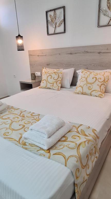 Postel nebo postele na pokoji v ubytování Elite Residence