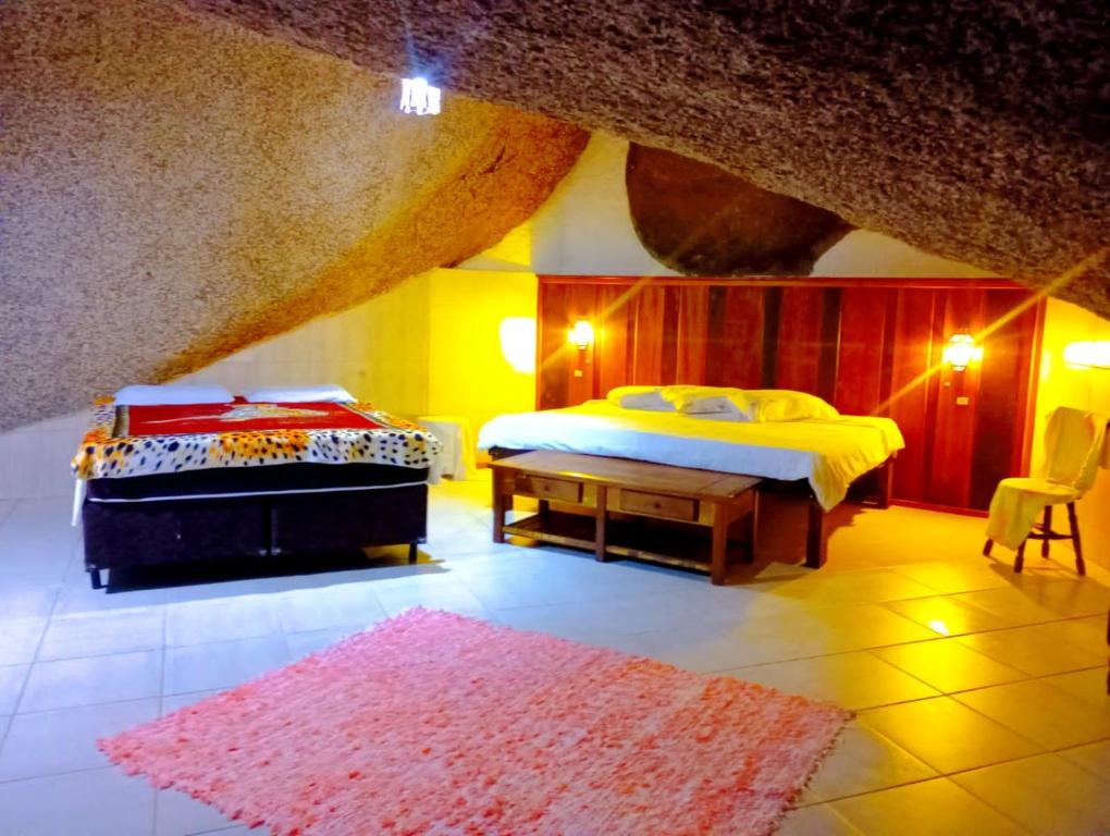 Krevet ili kreveti u jedinici u okviru objekta Enseada Das Pedras