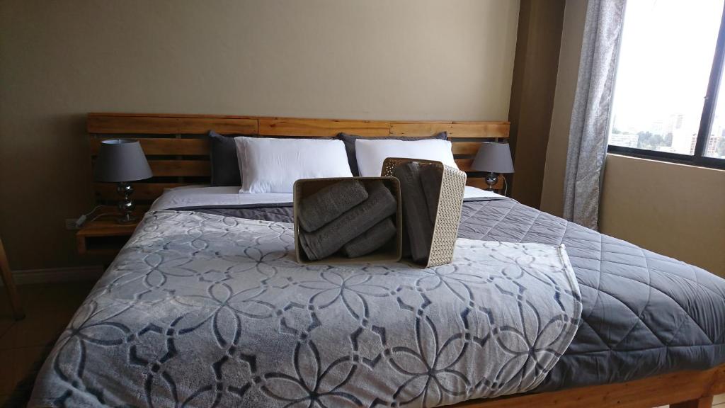 Postel nebo postele na pokoji v ubytování Tin House Quito