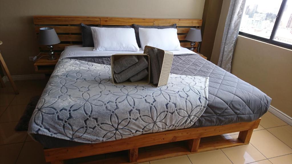 Postel nebo postele na pokoji v ubytování Tin House Quito