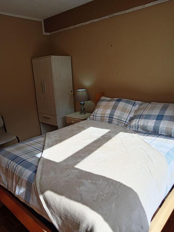 Postel nebo postele na pokoji v ubytování Tin House Quito