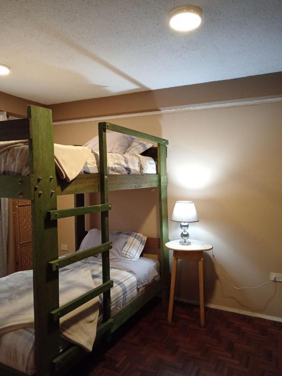 Postel nebo postele na pokoji v ubytování Tin House Quito