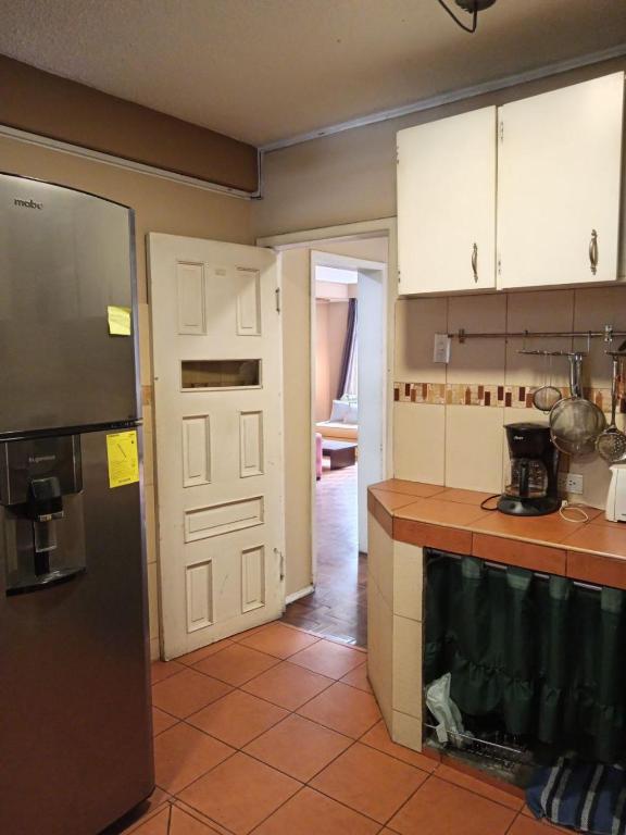 Kuchyň nebo kuchyňský kout v ubytování Tin House Quito