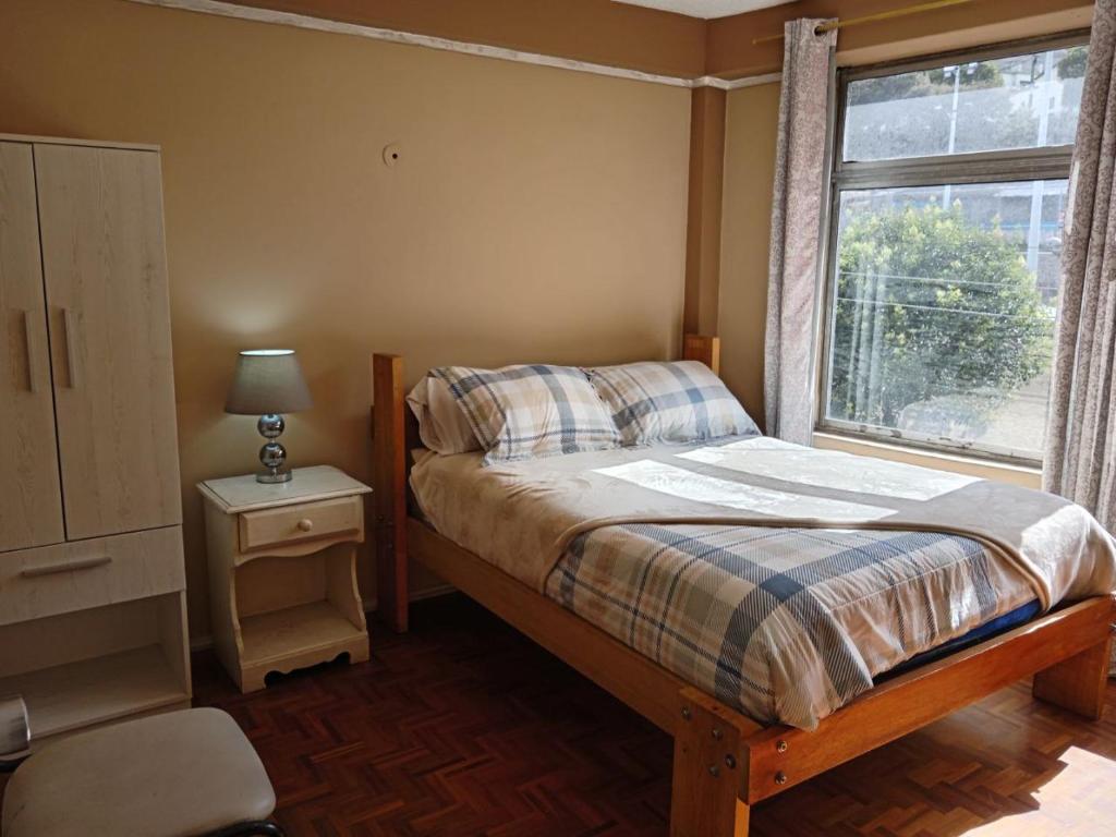 Postel nebo postele na pokoji v ubytování Tin House Quito