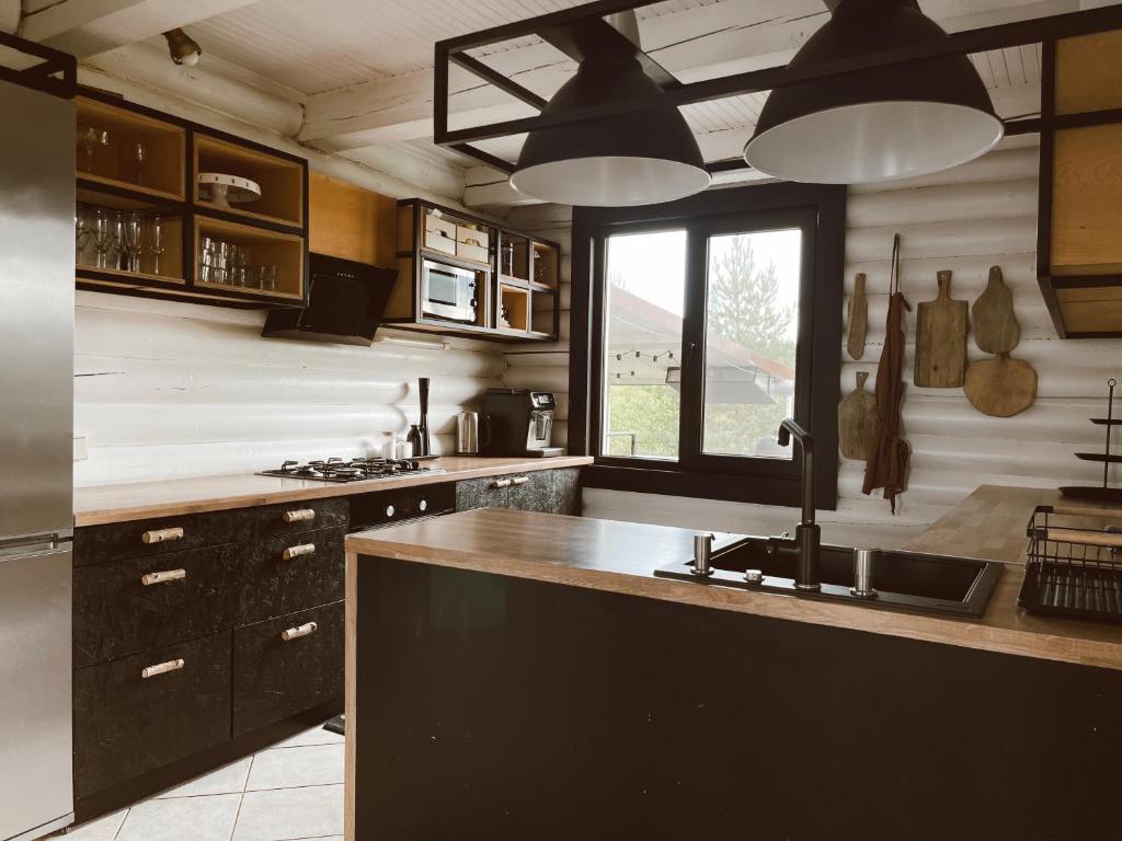 Kuchyň nebo kuchyňský kout v ubytování HYTTE - Cozy Stay For Families & Friends