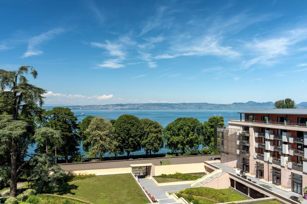 a view of the water from a building at Hilton Evian Les Bains in Évian-les-Bains