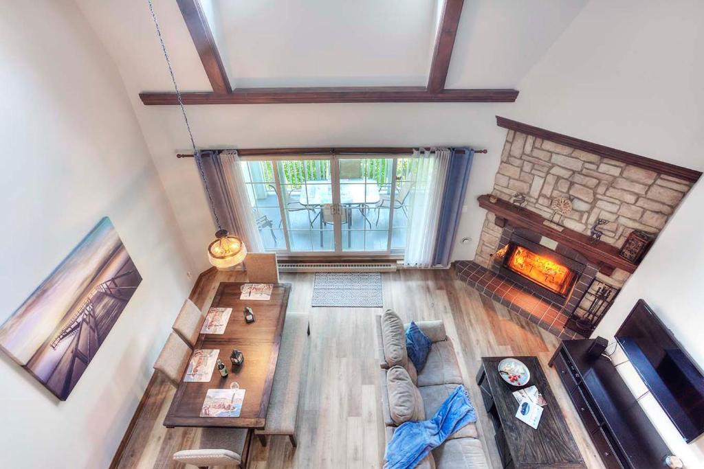 an overhead view of a living room with a fireplace at Sweet Getaway in Mont-Tremblant