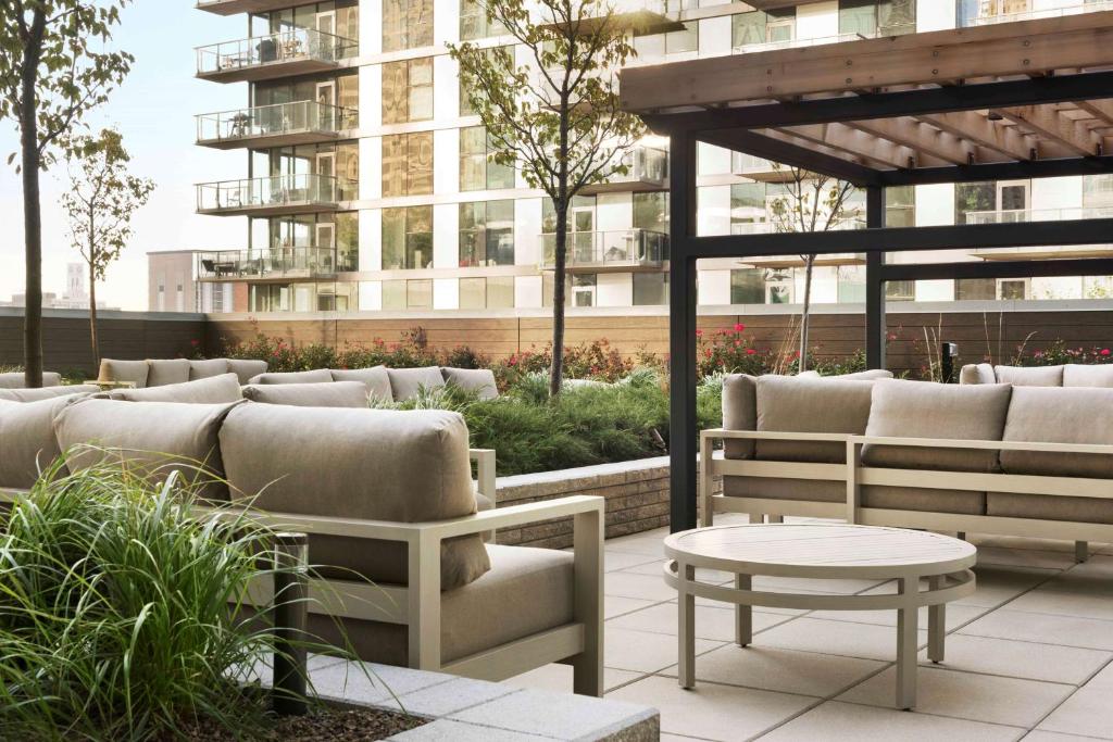 Suite kitchen and living area at Homewood Suites Chicago West Loop
