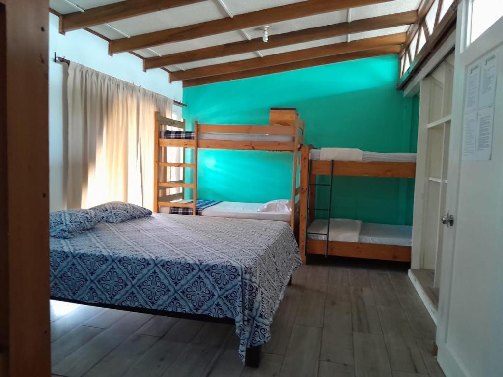 Postel nebo postele na pokoji v ubytování Gaudy's Hotel