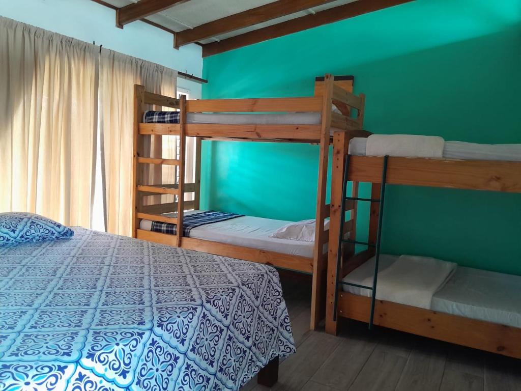 Postel nebo postele na pokoji v ubytování Gaudy's Hotel