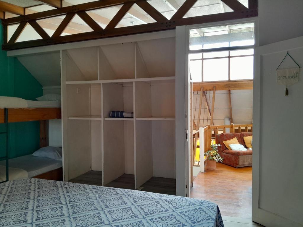 Postel nebo postele na pokoji v ubytování Gaudy's Hotel