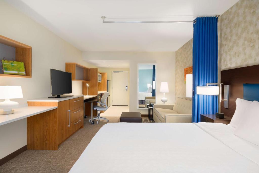 Postel nebo postele na pokoji v ubytování Home2 Suites By Hilton Joliet Plainfield