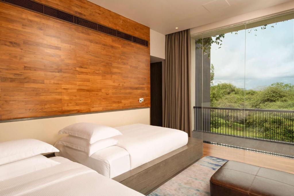 Posezení v ubytování DoubleTree by Hilton Weerawila Rajawarna Resort