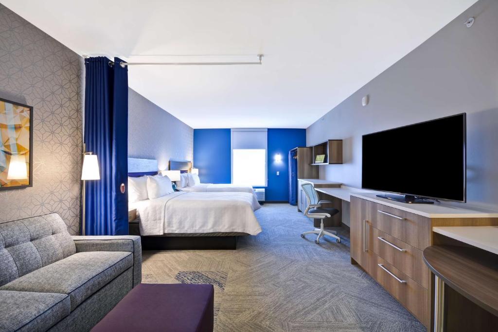 Postel nebo postele na pokoji v ubytování Home2 Suites By Hilton Plano Richardson
