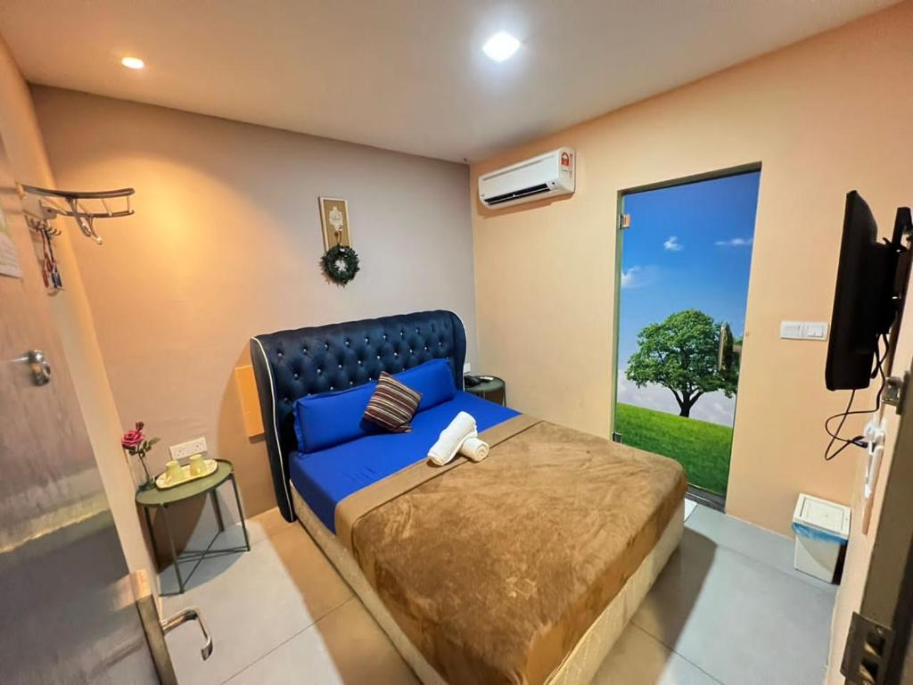 TV a/nebo společenská místnost v ubytování The Tree Boutique Hotel