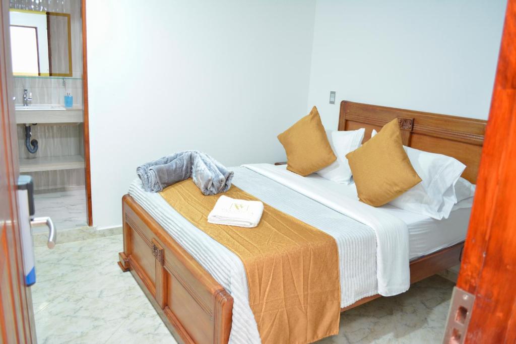 Postel nebo postele na pokoji v ubytování HOTEL EL VALENCIA