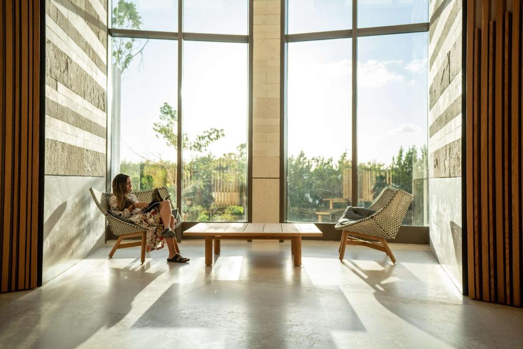 Posezení v ubytování Hilton Cancun, an All-Inclusive Resort