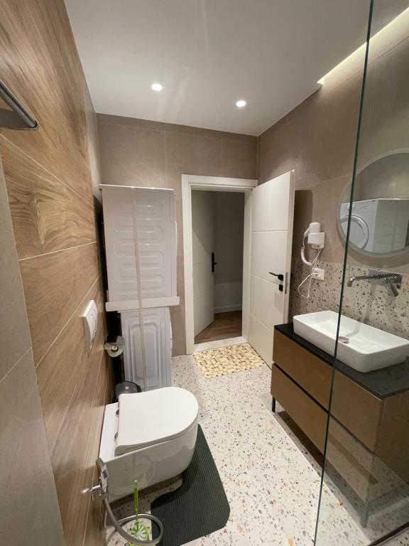 Koupelna v ubytování Downtown Studio Apartments
