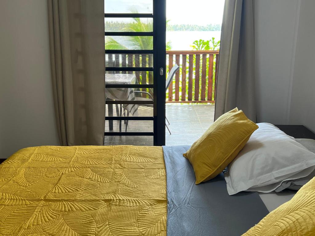 Postel nebo postele na pokoji v ubytování Villa Toa Pearl Bora Bora