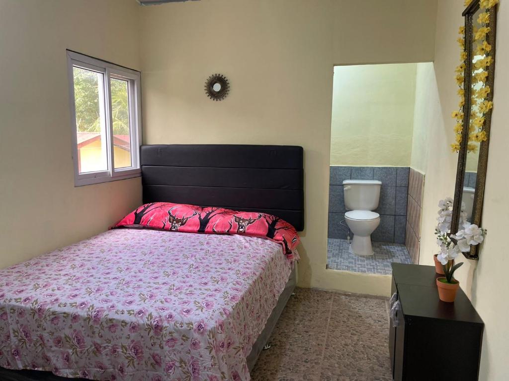 Кровать или кровати в номере Hotel Posada de Don Chusito