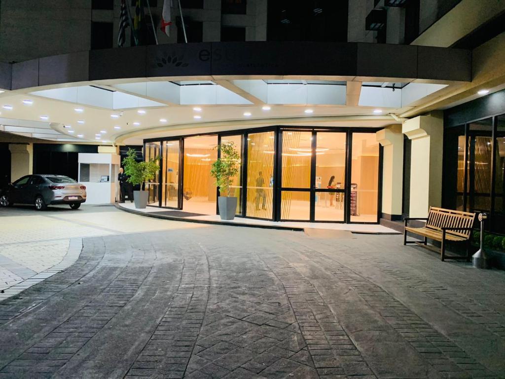 an empty parking lot in a building with a car at Flat Congonhas in São Paulo