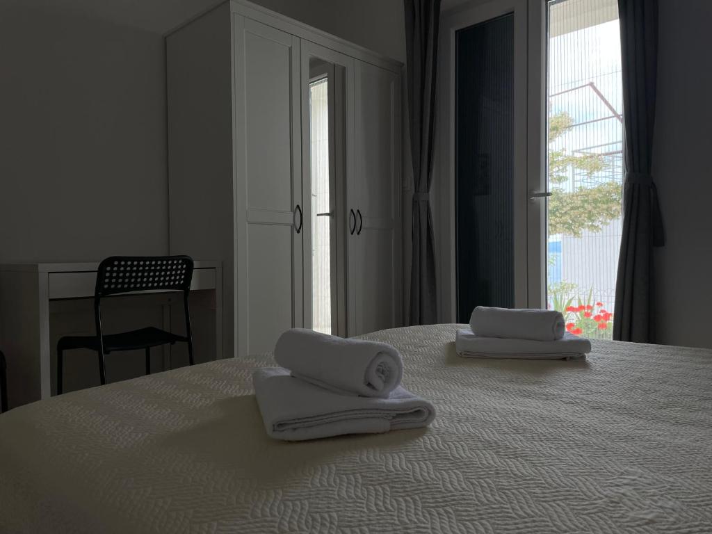 Postel nebo postele na pokoji v ubytování Apartments Tom