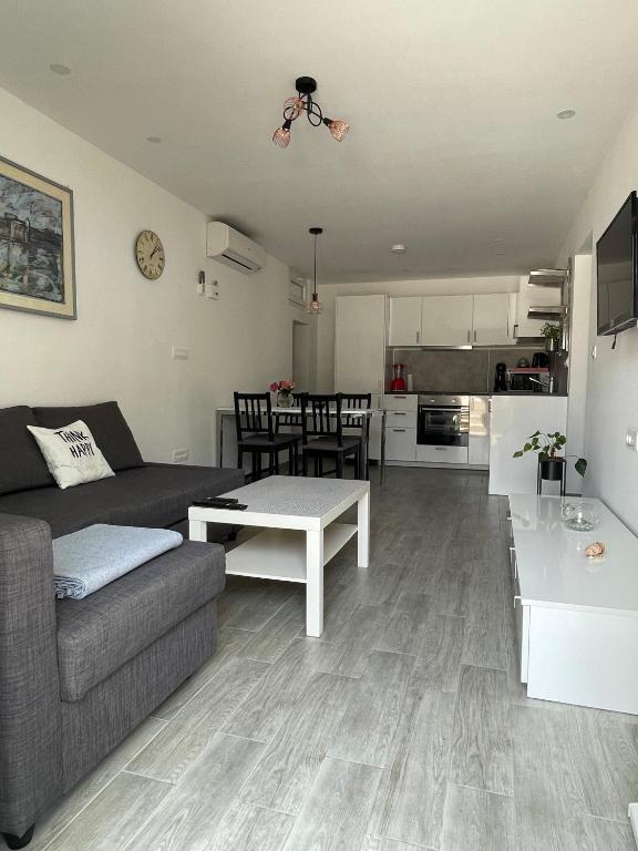 Kuchyň nebo kuchyňský kout v ubytování Apartments Tom